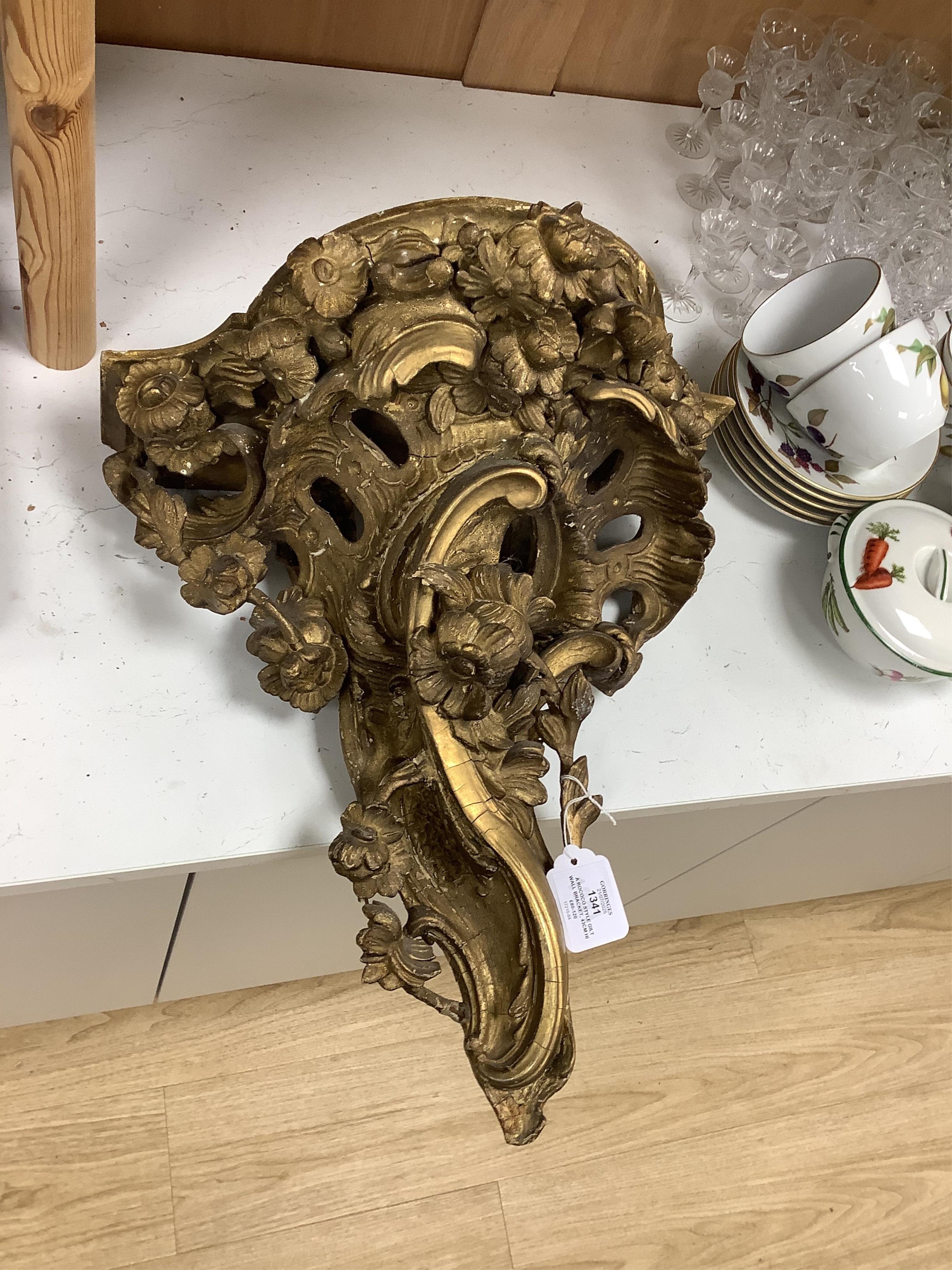A Rococo style gilt wall bracket, 43cm high